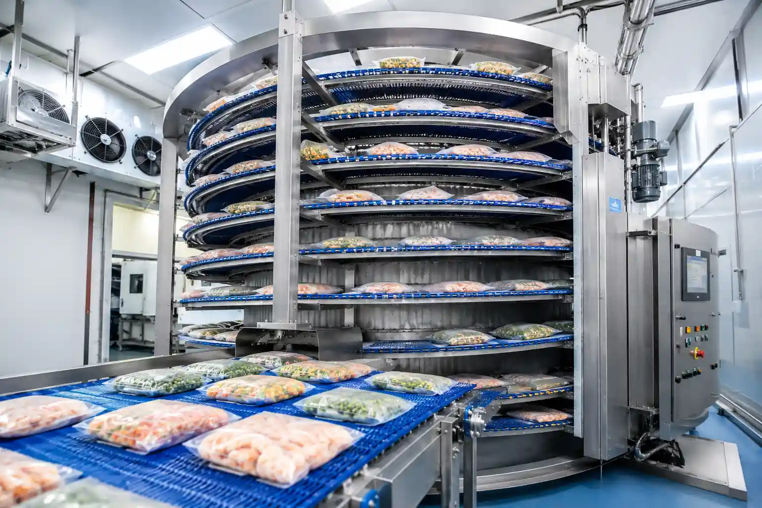 Industrial spiral freezer used for rapid food freezing in a food processing facility